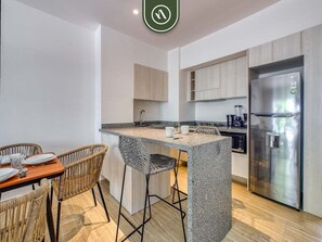 Apartment, 1 King Bed, Kitchen, Ocean View (Casa Las Palmas 102) | Private kitchen | Electric kettle, dining tables - New 1 BR Condo - Oceanview Pool - 2 min to Beach (Bucerías)