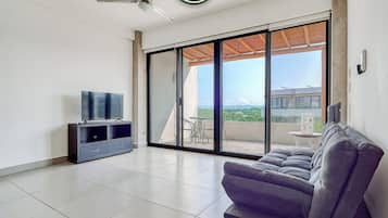 Departamento, 2 camas Queen size, cocina, vista a la playa (Puerta arena J22) | Área de sala de estar