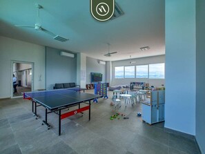 Departamento, varias camas, cocina, vista a la playa (DToscana PH01 - Sienna) | Sala de juegos