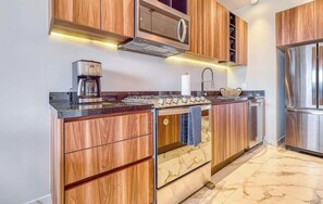 Departamento, varias camas, cocina, vista a la playa (DToscana PH01 - Sienna) | Cocina privada