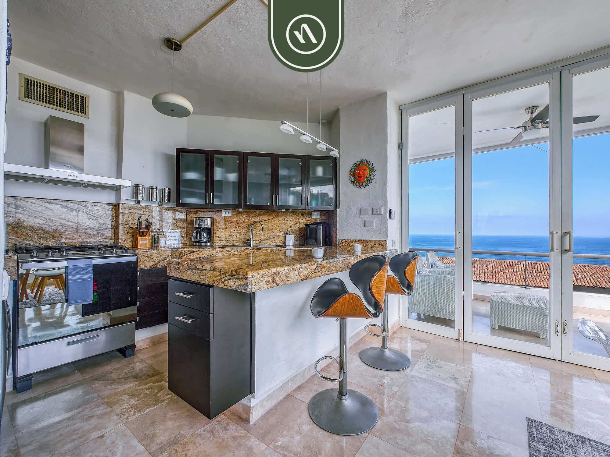 Departamento, varias camas, cocina, vista al océano (Las Peñas de Teresa 303) | Cocina privada | Comedor 