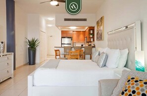 Studio, 1 King Bed, Patio, Partial Ocean View (Playa Royale Tower 1 1133) | 1 bedroom, individually decorated, individually furnished, bed sheets