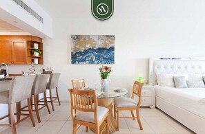 Studio, 1 King Bed, Patio, Partial Ocean View (Playa Royale Tower 1 1133) | Dining