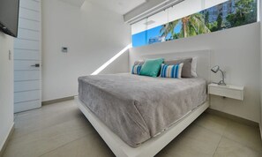 Apartment, Multiple Beds, Kitchen, Ocean View (Orchid Mezzanine A) | 2 bedrooms, individually decorated, individually furnished, bed sheets