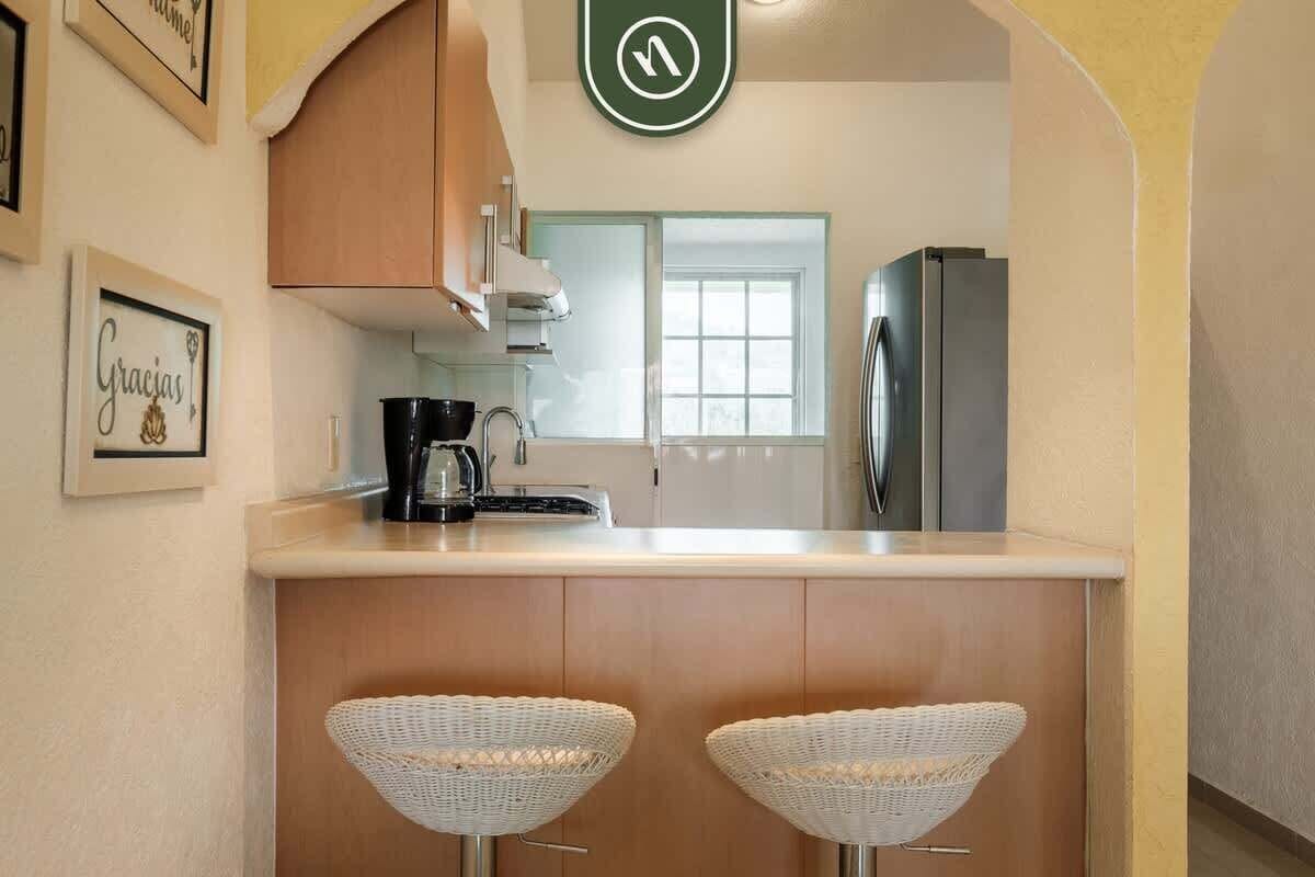 Apartment, Multiple Beds, Kitchen, Pool View (Diamante Lakes 323) | Private kitchen | Dining tables