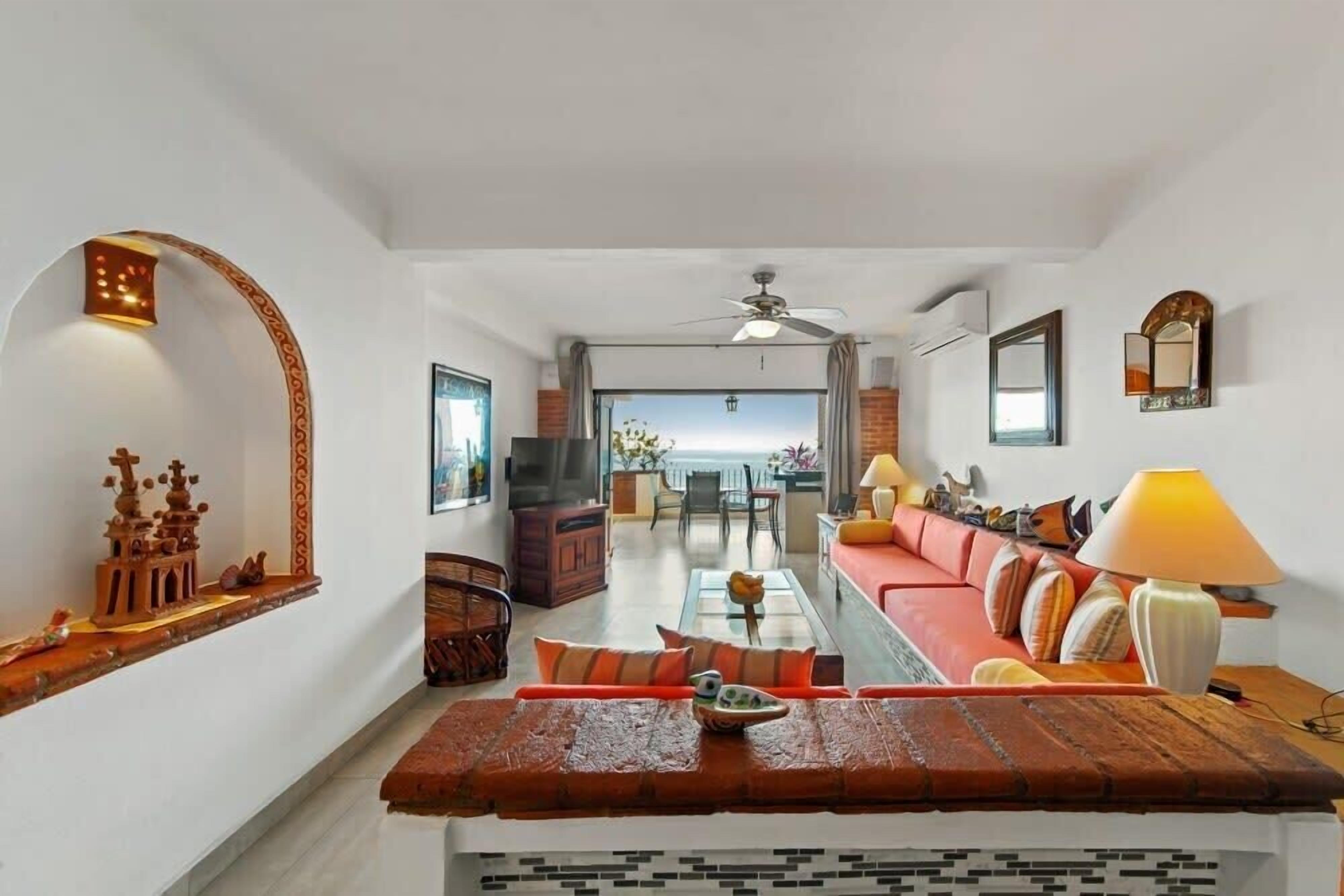 Departamento, varias camas, cocina, vista al océano (603-Plaza Mar) | Área de sala de estar | Televisión de pantalla plana de 42 pulgadas con canales digitales 