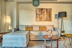 Apartment, Multiple Beds, Hot Tub, Beach View (V Golf 204) | Living area - Luxury 2 BR Condo Near Golf Courses and Marina (Puerto Vallarta)