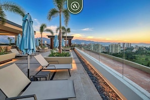 Apartment, Mehrere Betten, Whirlpool, Strandblick (V Golf 204) | Terrasse/Patio
