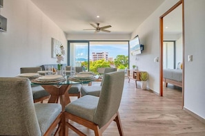 Apartment, Multiple Beds, Balcony, Beach View (Verde Mar Living 405) | 2 bedrooms, individually decorated, individually furnished, bed sheets