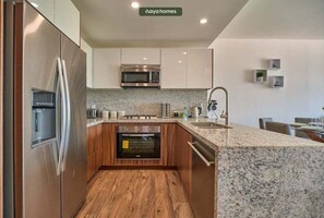 Apartamento, varias camas, balcón, vistas a la playa (Verde Mar Living 405) | Cocina privada