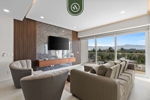 Apartment, Multiple Beds, Pool Access, Beach View (Quinta San Miguel 502 T3) | Living area - Tropical 2 BR Retreat - Close to the Beach - Pool (Nuevo Nayarit)