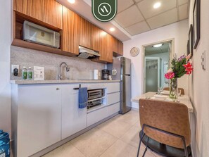 Studio, 1 King Bed, Kitchen, City View (Playa Royale T4 4001) | Private kitchen | Coffee/tea maker, dining tables - Cozy Beachfront Studio - Beach Club - Pools (Nuevo Nayarit)