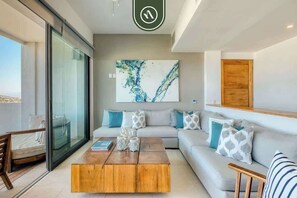 อพาร์ทเมนท์, หลายเตียง, ห้องครัว, วิวชายหาด (Joya Departamento 5) | บริเวณนั่งเล่น | ทีวีจอแบน 42 นิ้ว พร้อมช่องดิจิตอล