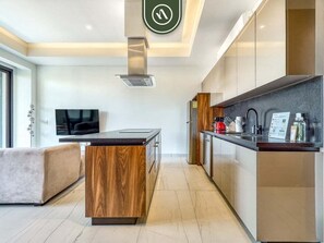 Departamento, 1 cama Queen size, hidromasaje, vista al océano (Madero 320 B103) | Cocina privada | Tetera eléctrica