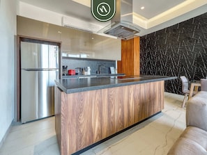 Apartment, 1 Queen Bed, Kitchen, Ocean View (Madero 320 103) | Private kitchen | Coffee/tea maker, dining tables