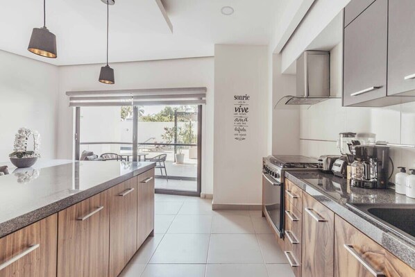 Apartment, Multiple Beds, Kitchen, Beach View (DellaTerra 1A) | Private kitchen | Coffee/tea maker, dining tables - Cozy 2BR House 2 min to the Beach - Pool - Terrace (Bucerías)