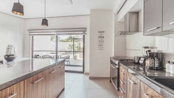 Condo, varias camas, acceso a la alberca, vista a la playa (DellaTerra 1A) | Cocina privada