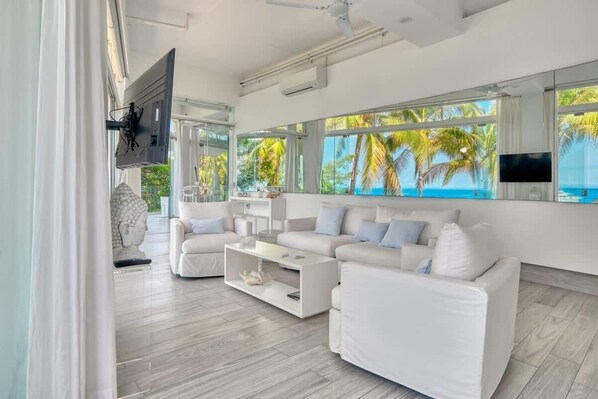 Apartment, 1 King Bed, Kitchen, Ocean View (Orchid-S2) | Living area | 42-inch flat-screen TV with digital channels