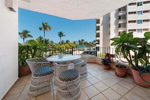Apartment, Multiple Beds, Pool Access, Ocean View (305-VistadelSol) | Outdoor dining