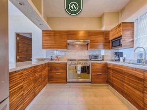 Apartment, Multiple Beds, Kitchen, Ocean View (Flamingos Beach and Golf 102) | Private kitchen