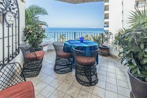 Apartment, Multiple Beds, Kitchen, Ocean View (805-VistadelSol) | Outdoor dining