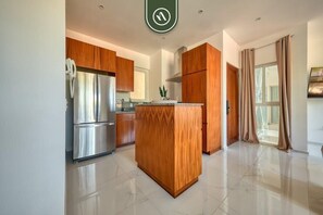 Apartment, Mehrere Betten, Balkon (Grand Trianon 405) | Eigene Küche | Esstisch