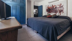 Condo, Multiple Beds, Terrace, Ocean View (La Palapa 106) | 2 bedrooms, individually decorated, individually furnished, bed sheets