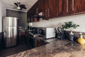 Apartment, Multiple Beds, Kitchen, Ocean View (La Palapa 106) | Private kitchen | Dining tables