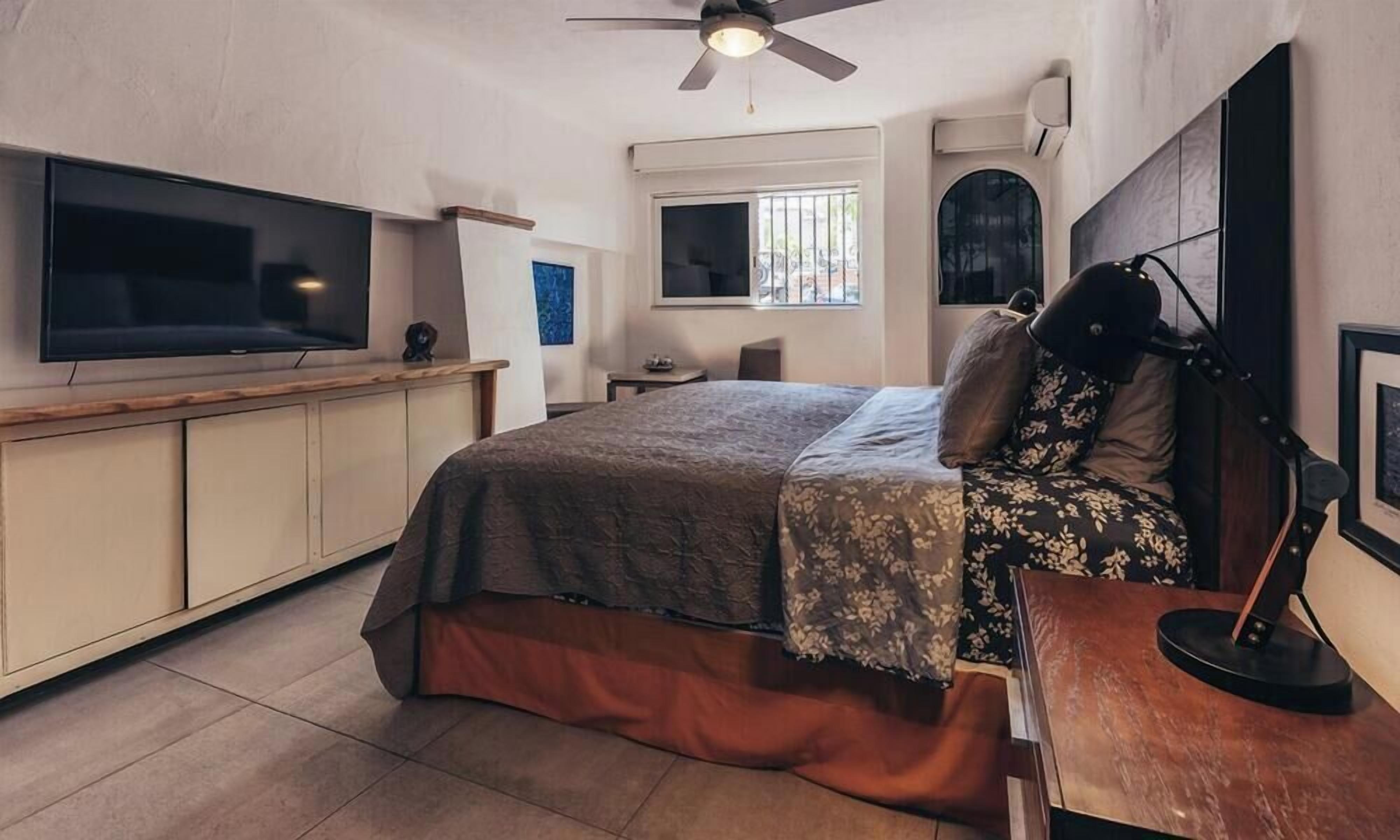 Condo, Multiple Beds, Terrace, Ocean View (La Palapa 106) | 2 bedrooms, individually decorated, individually furnished, bed sheets
