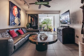 Apartment, Multiple Beds, Kitchen, Ocean View (La Palapa 106) | Living area | 42-inch flat-screen TV with digital channels