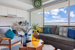 Apartment, 2 Queen Beds, Kitchen, Pool View (Maritima Golf 5J) | Living area | 42-inch flat-screen TV with digital channels - New 2BR APT - Beach Access - Pool - GYM - Jacuzzi (Nuevo Nayarit)