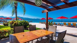 Outdoor dining - Amazing Condo With Ocean View - Jacuzzi - Beach (Puerto Vallarta)