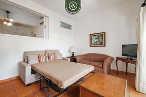 Apartment, Multiple Beds, Balcony, Ocean View (One Beach Street 310 C) | Living area | 42-inch flat-screen TV with digital channels