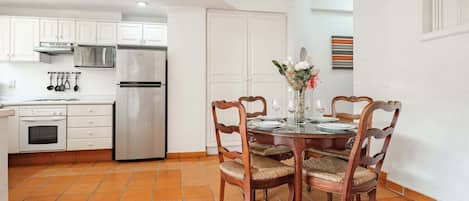 Apartment, Multiple Beds, Balcony, Ocean View (One Beach Street 310 C) | Private kitchen | Coffee/tea maker, dining tables