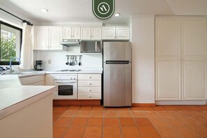 Apartment, Multiple Beds, Balcony, Ocean View (One Beach Street 310 C) | Private kitchen - Amazing 2 BR Condo - Private Terrace - Pool (Puerto Vallarta)