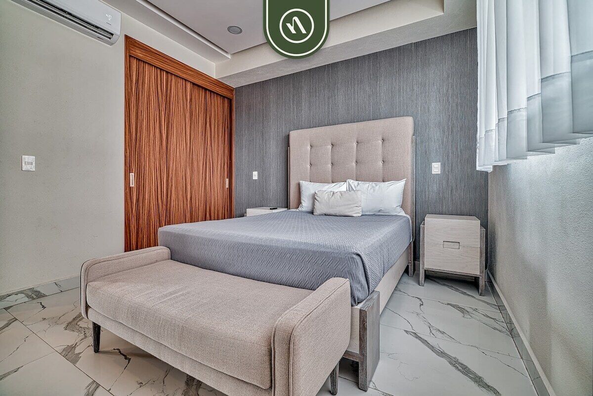 Condo, varias camas, balcón, vista a la alberca (Quinta San Miguel 502 T2) | 2 habitaciones, decoración personalizada y muebles diferentes 