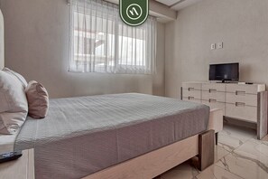 Condo, varias camas, balcón, vista a la alberca (Quinta San Miguel 502 T2) | 2 habitaciones, decoración personalizada y muebles diferentes 