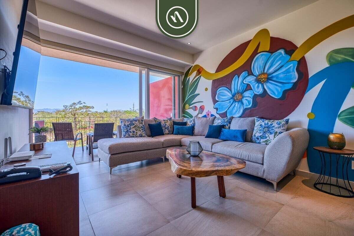 Departamento, varias camas, acceso a la alberca, vista al océano (DToscana 308 Pisa) | Área de sala de estar