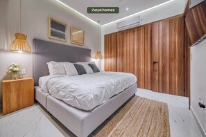 Condo, 1 King Bed with Sofa bed, Hot Tub, Ocean View (Dsire 402) | 1 bedroom, individually decorated, individually furnished, bed sheets