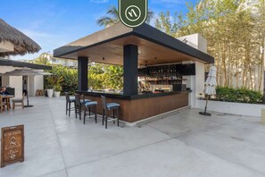 Apartment, Multiple Beds, Kitchen, Ocean View (Marival Residences PH 615) | Bar (on property)