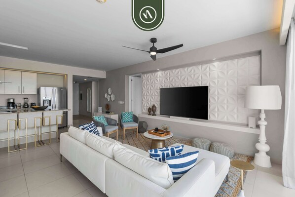 Apartment, Multiple Beds, Kitchen, Ocean View (Marival Residences PH 615) | Living area | 42-inch flat-screen TV with digital channels