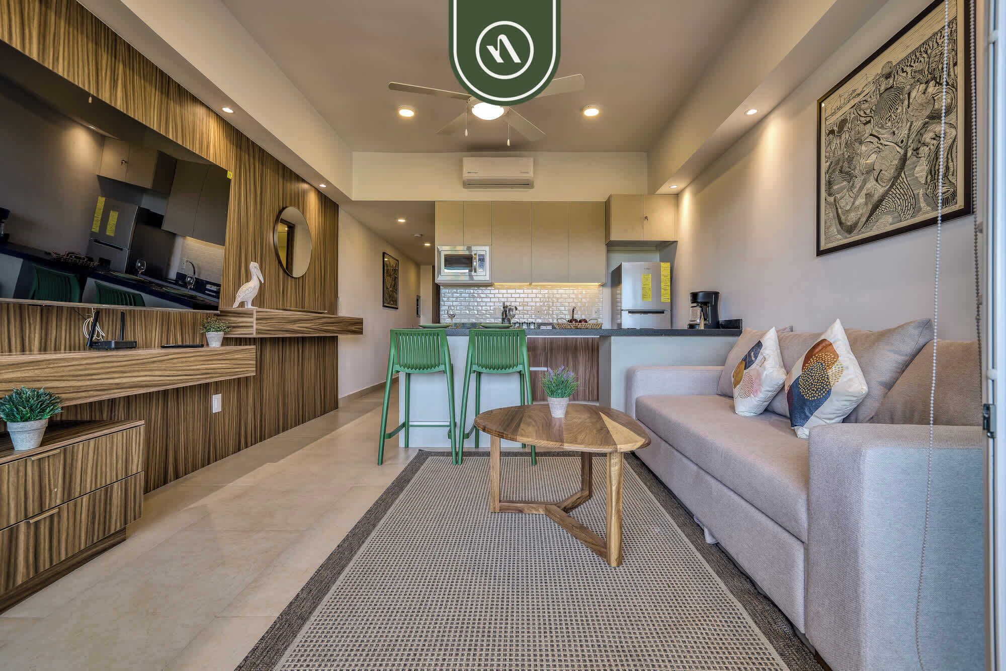 Departamento, 1 cama matrimonial y sofá cama, cocina, vista al campo de golf (Altamar 413) | Área de sala de estar | Televisión de pantalla plana de 42 pulgadas con canales digitales 