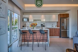 Condo, Multiple Beds, Pool Access, Ocean View (Pavilion Bucerias 205) | Private kitchen - 2BR Condo With Rooftop Pool - 2 Min Walk to Beach (Bucerías)
