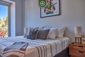 Condo, Multiple Beds, Pool Access, Ocean View (Pavilion Bucerias 205) | 2 bedrooms, individually decorated, individually furnished, bed sheets - 2BR Condo With Rooftop Pool - 2 Min Walk to Beach (Bucerías)