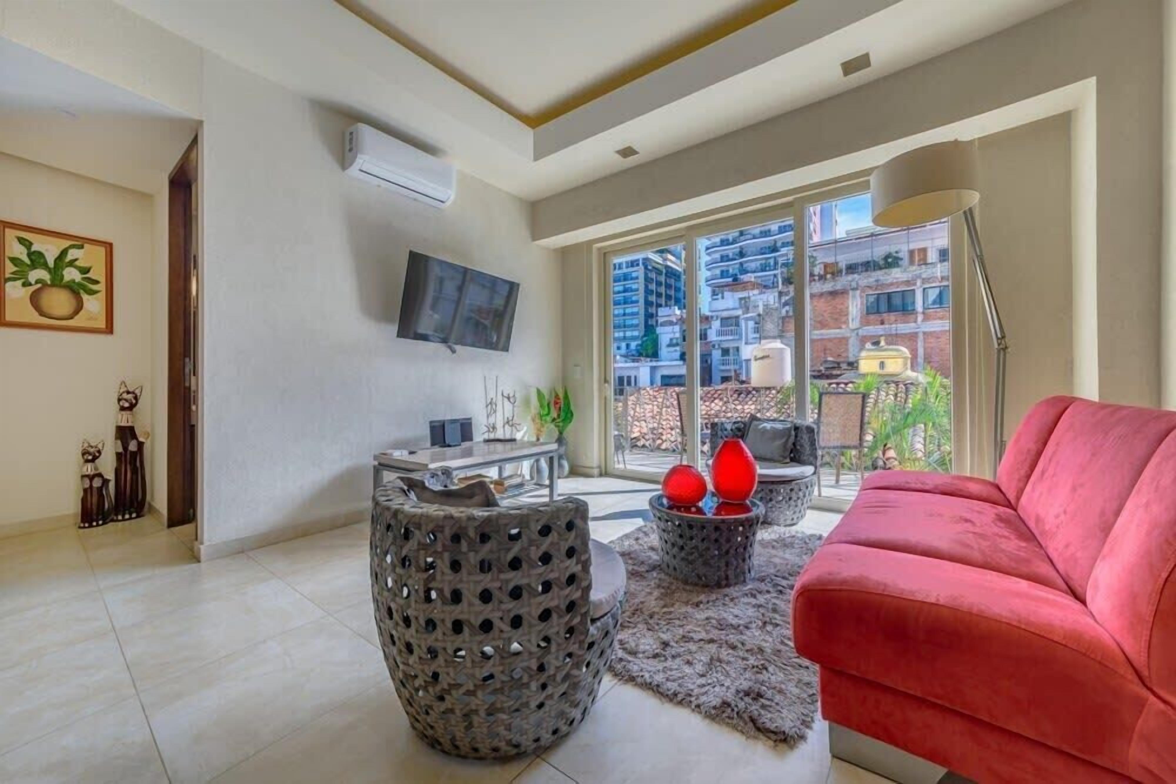 Studio, 1 King Bed, Kitchen, Ocean View (V177 303) | Living area | 42-inch flat-screen TV with digital channels, MP3 dock