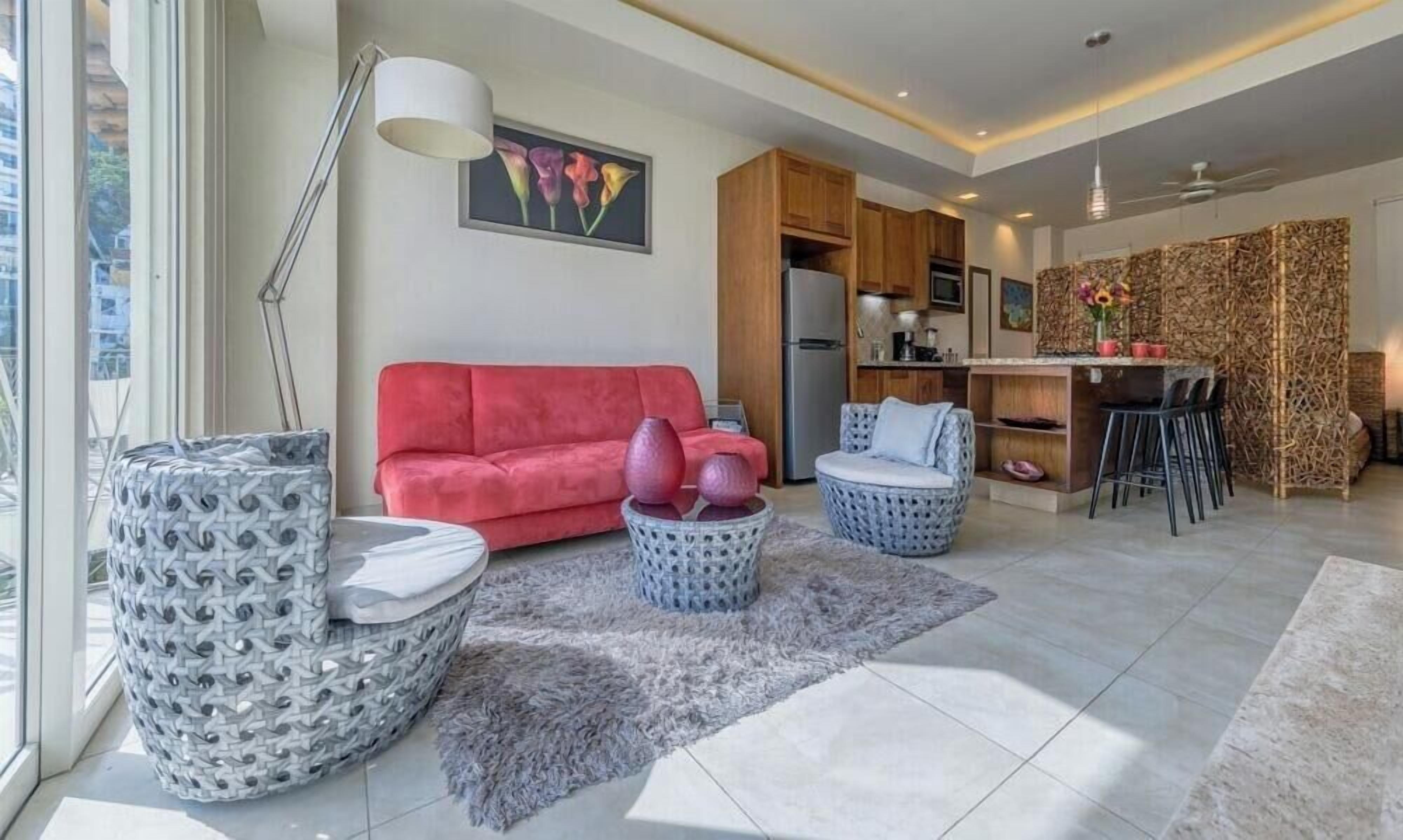 Studio, 1 King Bed, Kitchen, Ocean View (V177 303) | Living area | 42-inch flat-screen TV with digital channels, MP3 dock