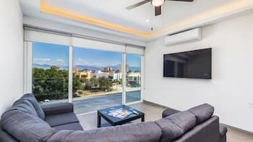 Condo, Multiple Beds, Kitchen, Pool View (Believe Condo Flamingos Believe 302) | Living area