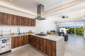 Condo, Multiple Beds, Kitchen, Pool View (Believe Condo Flamingos Believe 302) | Private kitchen | Coffee/tea maker, dining tables - Believe Condo Flamingos Believe 302 (Bucerías)