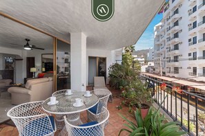 Apartment, Multiple Beds, Kitchen, Ocean View (Vista del sol 215) | Outdoor dining - Beachfront 2 BR Condo in Romantic Zone - Roof Pool (Puerto Vallarta)