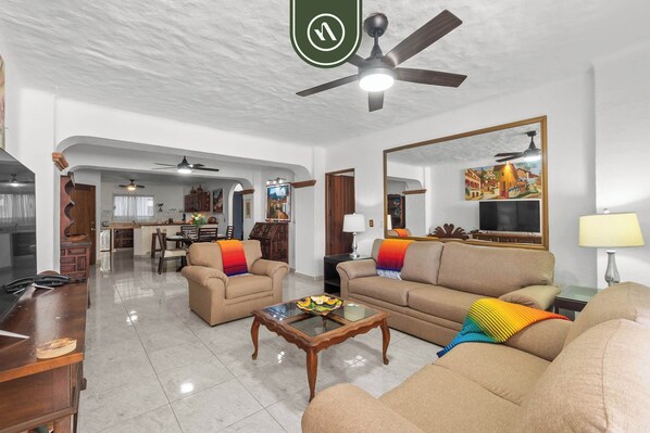 Apartment, Multiple Beds, Kitchen, Ocean View (Vista del sol 215) | Living area | 42-inch flat-screen TV with digital channels - Beachfront 2 BR Condo in Romantic Zone - Roof Pool (Puerto Vallarta)